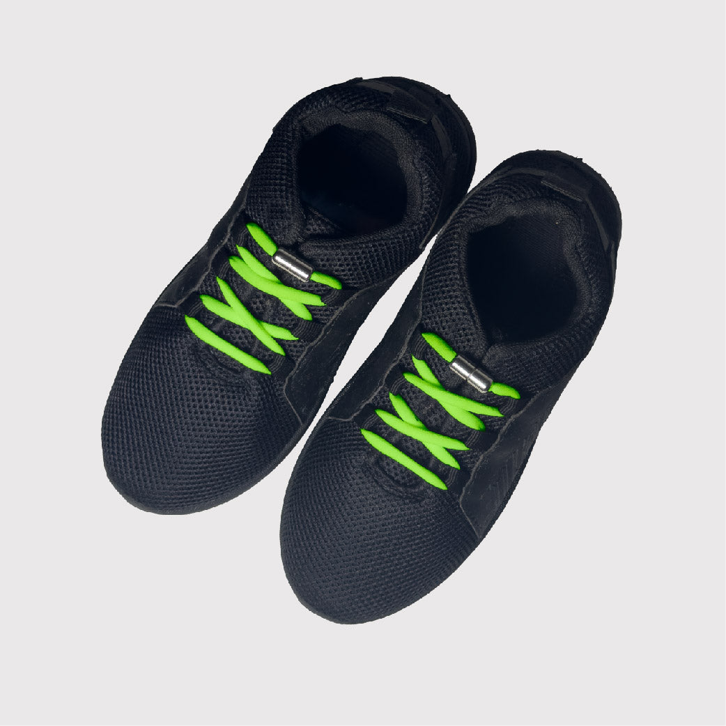 black shoes with green no tie shoelaces