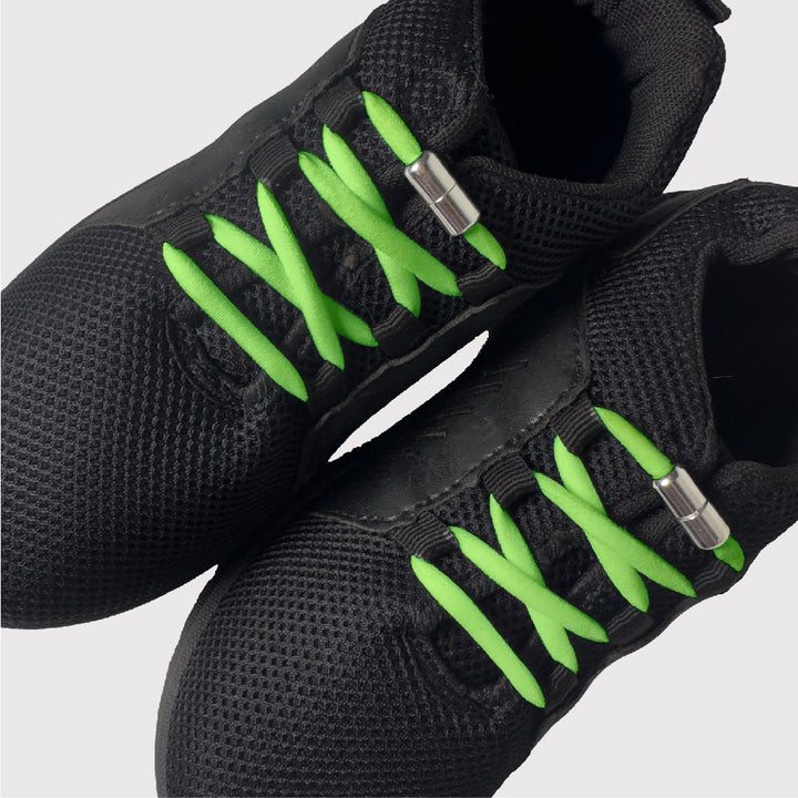 black shoes with green no tie shoelaces