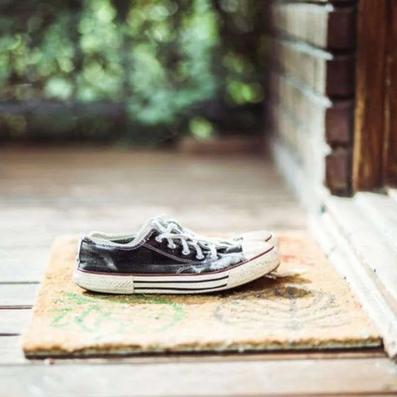 shoes on door mat