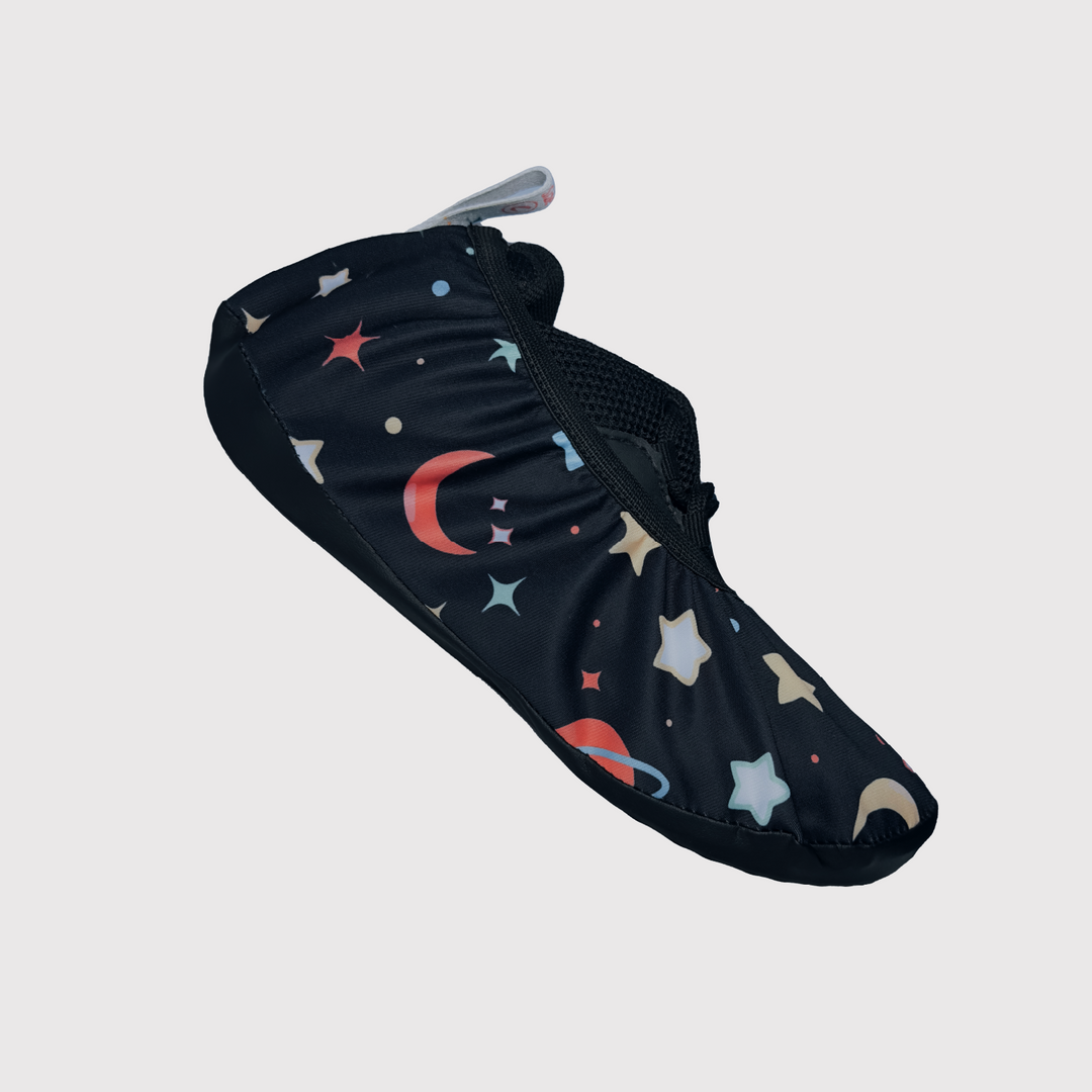 side view of shoe cover, black fabric with planets pattern